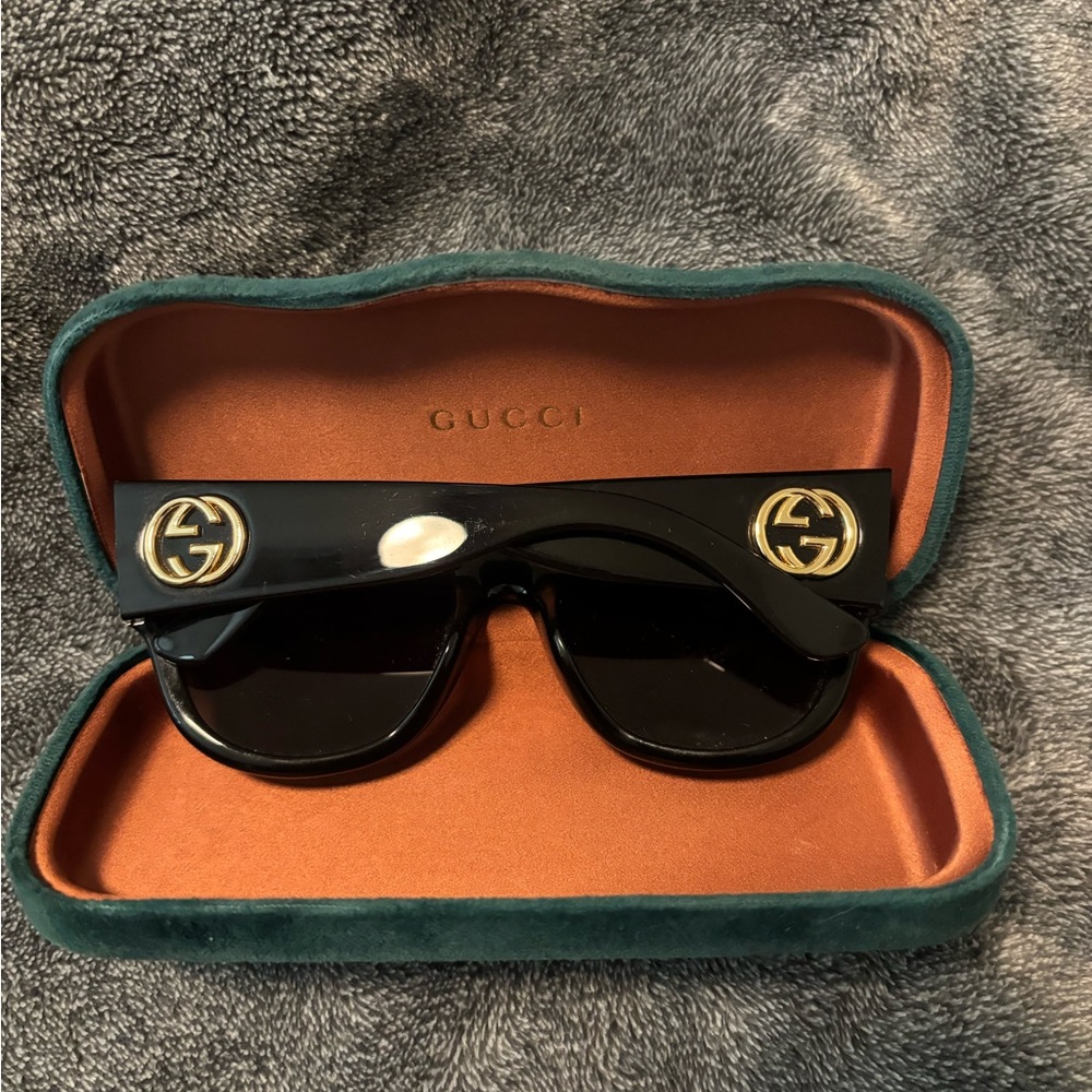 Gucci Black and gold Sunglasses